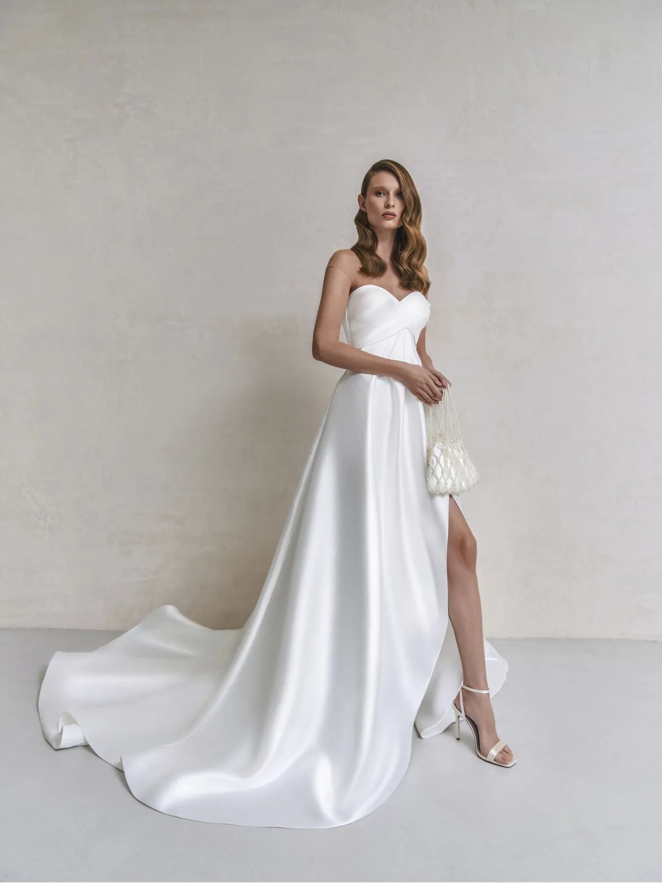 modern sweetheart neck A-line satin wedding gown modern sweetheart neck a line wedding dress with a slit