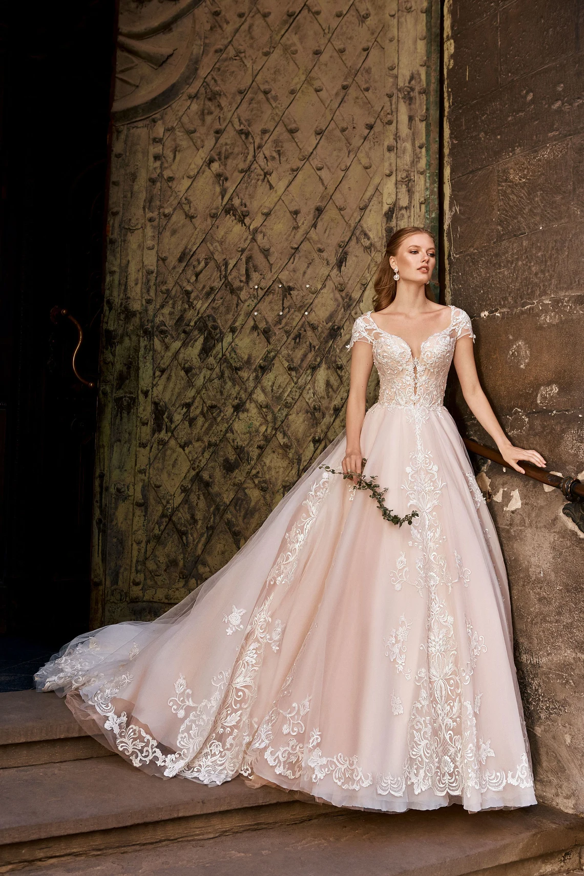 blush colored wedding ball gown with cap sleeves