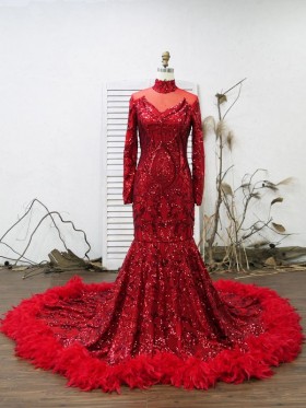 red sequin prom gown with feather trim