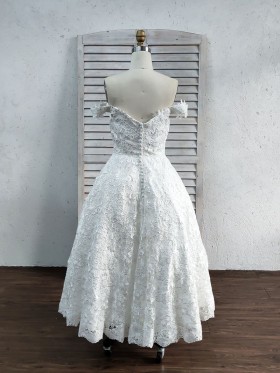 delicate ivory lace tea length wedding gown