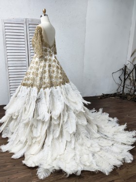 gold beaded lace appliqued ostrich feather ball gown