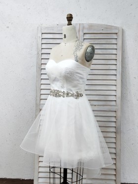 short white bridal dress with beadings and pleated tulle short white bridal dress with beadings and pleated tulle