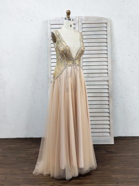 pluging neckline beaded bodice champagne prom dress