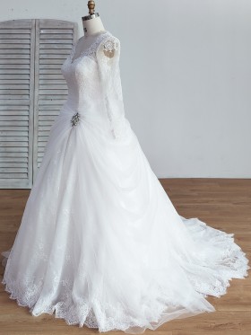 ivory lace long sleeve ball gown wedding dress with pick up tulle skirt