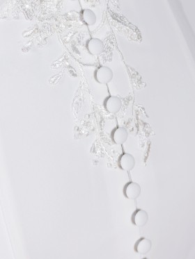 ivory lace appliqued button back wedding dress