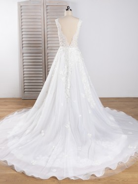 ivory lace and tulle long wedding dress with detachable overskirt