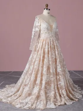 floral lace with nude tulle long sleeve wedding dress