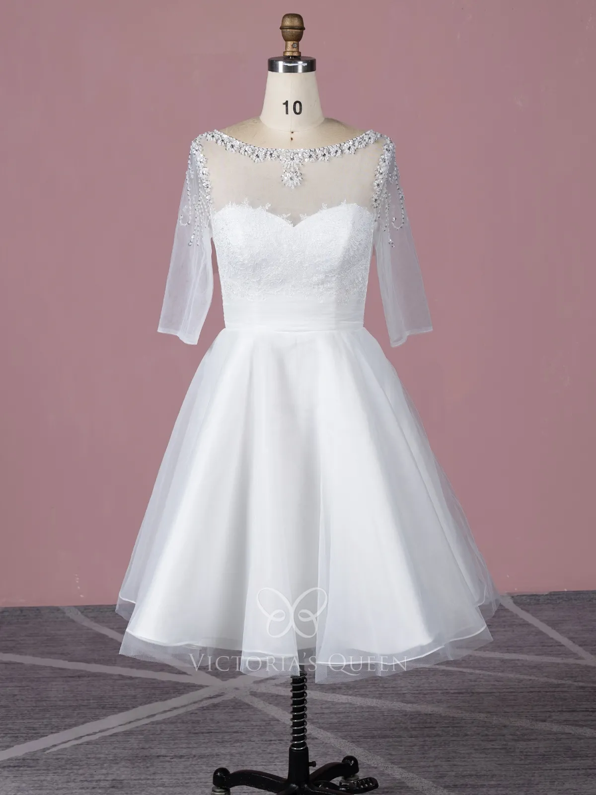 beaded boat neck and three quarter length sleeve tea length bridal dress
