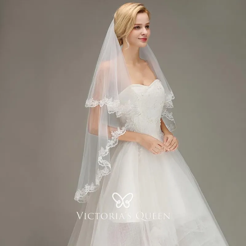 fingertip length tulle bridal veil with lace trim fingertip length tulle bridal veil with lace trim