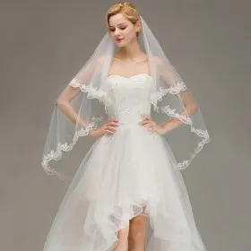 sheer fingertip length bridal veil with beautiful lace trim