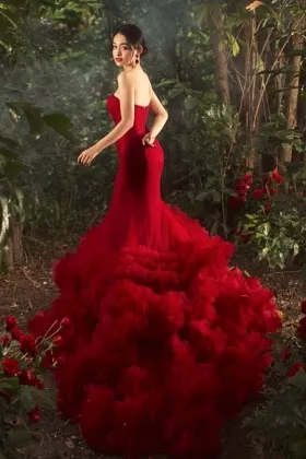 red body hugging tiered ruffled long train prom dress