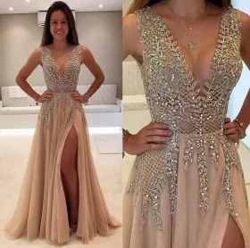Charming beading plunging neckline and champagne tulle thigh high slit prom dress