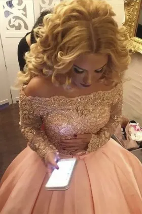 Stunning beaded blush lace and satin off the shoulder long sleeve evening ball gown