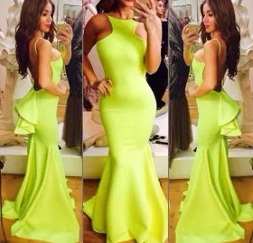 Unique lime green spandex mermaid low back with ruffle knot prom dress