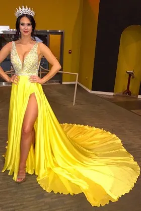 Beaded shiny yellow long pageant dress with thigh high slit and long train
