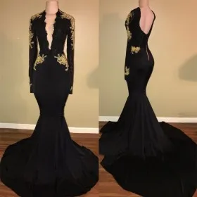 Unique gold lace appliqued black mermaid long sleeve prom dress with long train