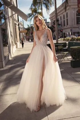 Beaded plunging V neck sheer tulle designer formal gown