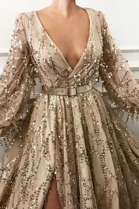 Bedazzled shiny gold sequin embellished plunging V neckline long sleeve gown