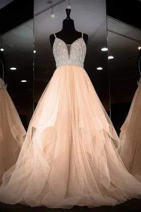 Sparkly beaded bodice with plunging sweetheart neckline prom dress
