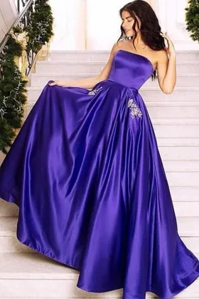 Strapless regency satin prom dress with beaded pockets