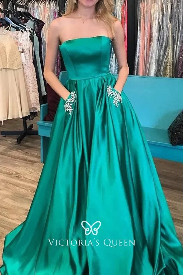 Strapless sleek satin prom dress with beaded pockets Strapless sleek satin prom dress with beaded pockets