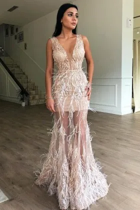 Unique ostrich feather appliqued beige sheer prom dress