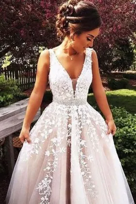trailing white lace appliqued plunging V neckline blush tulle timeless prom dress