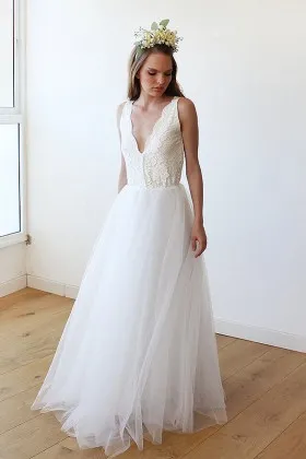 floor length ivory scalloped plunging lace and tulle informal wedding dress