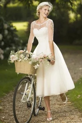 Beaded illusion neckline ivory lace and tulle tea length rustic wedding dress