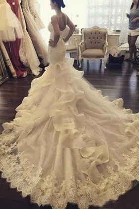 ruffled tulle wedding dress with chapel train