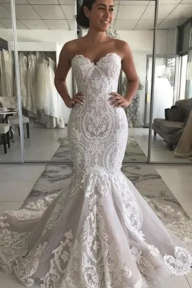 unique lace with nude lining trumpet wedding gown