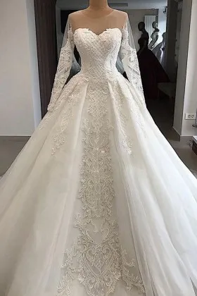 illusion sweetheart long sleeve pearled bridal ballgown