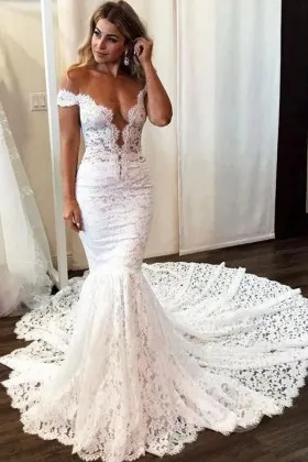 scalloped lace plunging neck mermaid fancy wedding gown