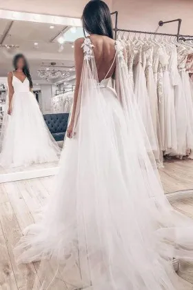 low back with floral draped white tulle wedding dress