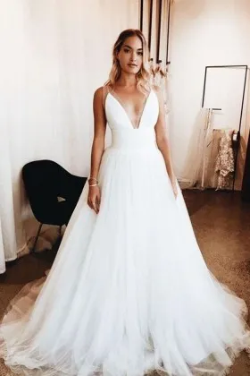 tulle overlay satin plunging neck trending bridal dress