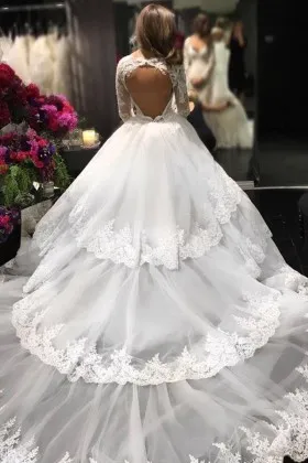 open back tiered lace tulle cathedral train bridal gown