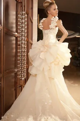 oversized ruffled flowers high low unique wedding dress