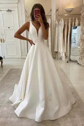 Simply sleek ivory satin curved V neck wedding dress
