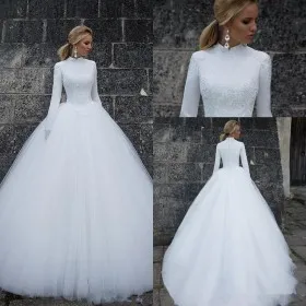 traditional high neckline long sleeve wedding ball gown