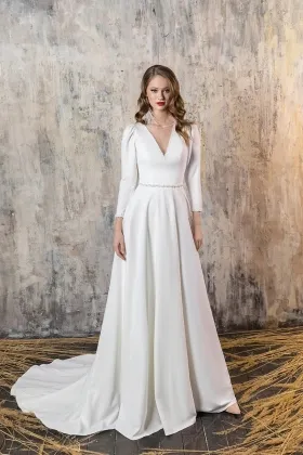 sleek satin beaded long sleeve a line designer wedding gown