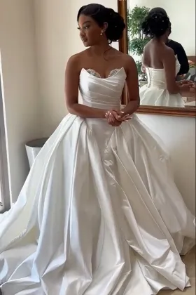 lace detailed ivory ruched satin ball gown wedding dress