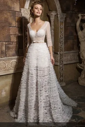 plunging V neckline pearls sheer 3 4 sleeve unique ruffled wedding dress