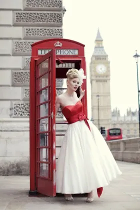 1970s inspired vintage strapless red and white tea length wedding dress