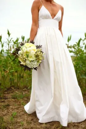 ivory plunging V neck spaghetti straps spring destination wedding dress