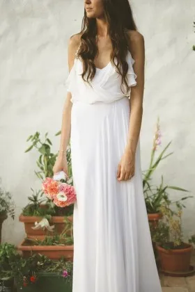 Flattering ruffled white chiffon long wedding dress with spaghetti straps