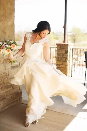 Scalloped lace cap sleeve jagged sweetheart neckline ivory destination wedding dress