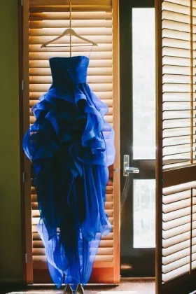 Uniquely royal blue strapless pleated ruffled high low wedding dress