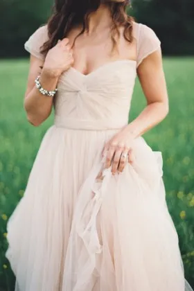 Beautiful blush tulle twisted Queen Anne neckline draped long wedding dress