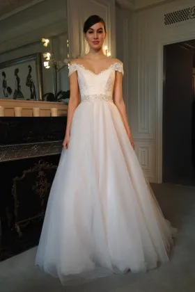 Modern ivory lace and tulle V neck cap sleeve beaded long wedding gown
