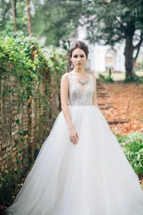 Beaded plunging V neckline chic ivory tulle ball gown wedding dress
